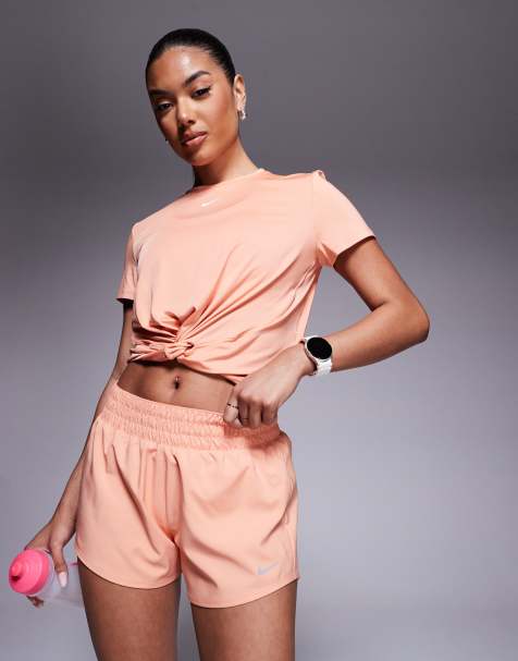 Nike One Training Dri-FIT mid rise 3 inch shorts in coral