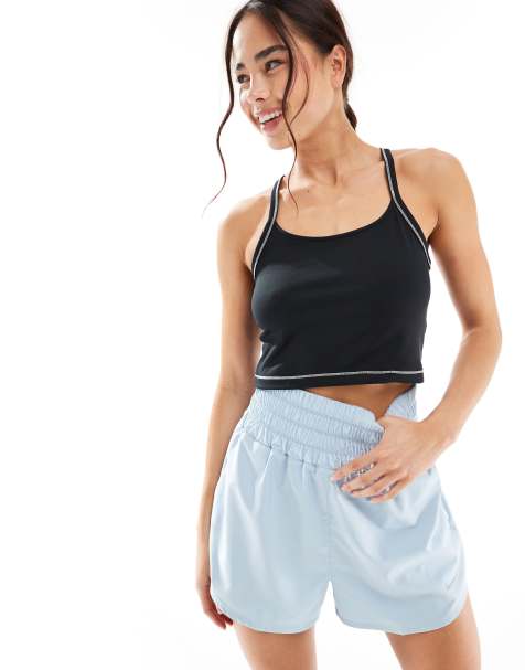 Nike One Training Dri-Fit stitch detail cropped ribbed tank top in black - view 1