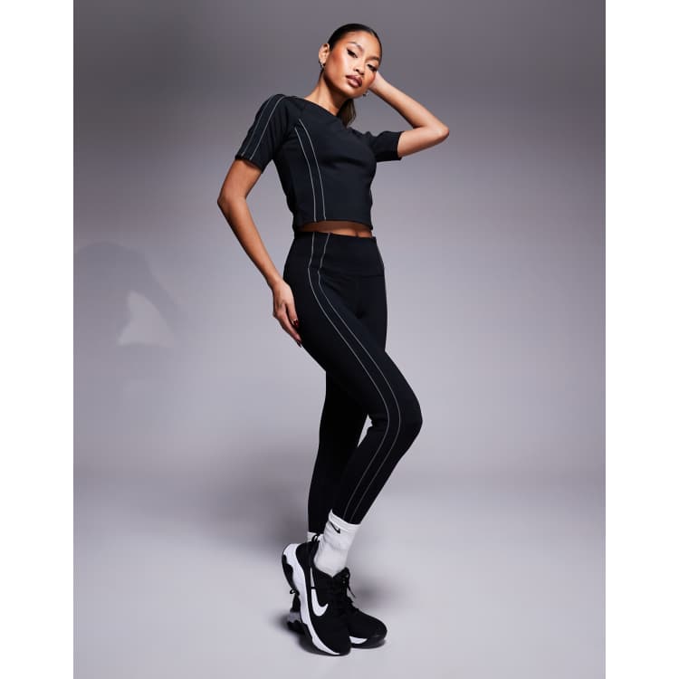 Nike One Training reflective piping high waisted 7 8 leggings in black ASOS