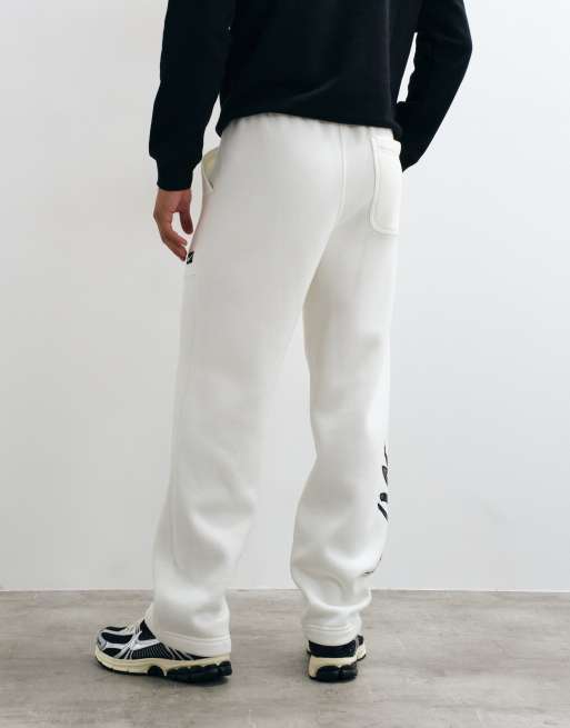 Nike open hem joggers with logo graphic in cream, 3 of 5