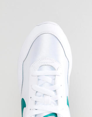 nike outburst trainers in white and green