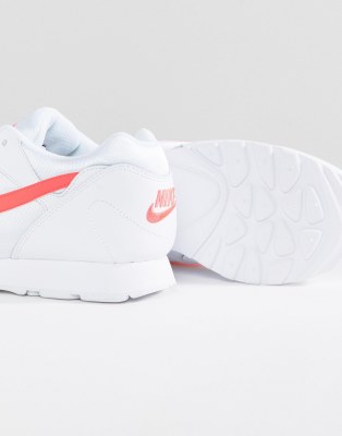nike outburst trainers in white and pink