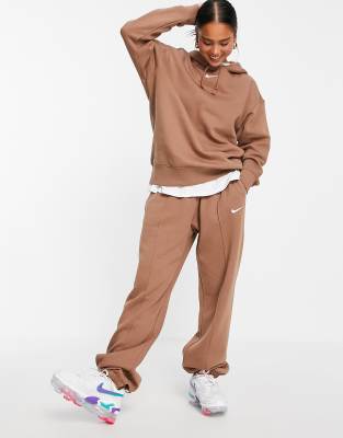 nike mini swoosh oversized tracksuit in earth brown