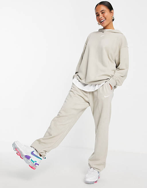 Women Nike oversized fleece joggers in cream ombre 