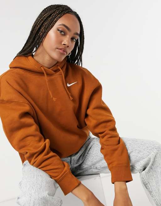 Nike - Oversized hoodie met mini-swoosh in geelbruin | ASOS