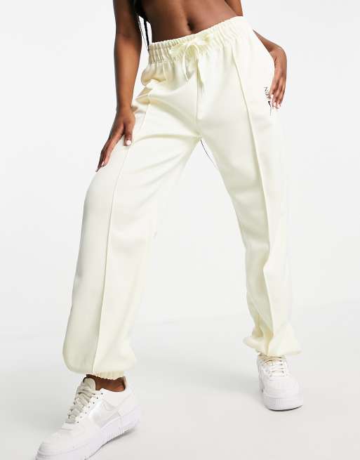 Nike oversized joggers in off white with drawcord ASOS