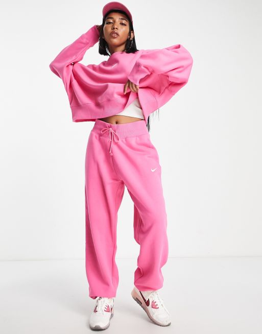 Nike - Oversized joggingbroek met hoge taille en mini swoosh in roze