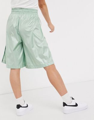 nike oversized swoosh pocket green shorts