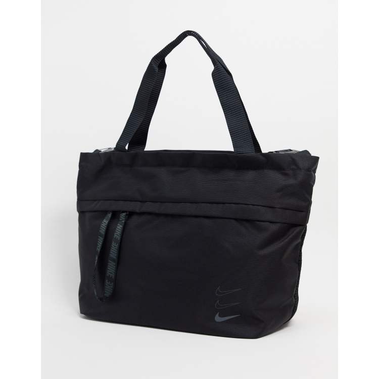 Nike oversized swoosh tote bag in black ASOS