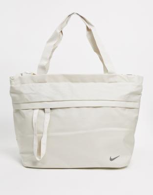 Nike oversized swoosh tote bag in cream | ASOS