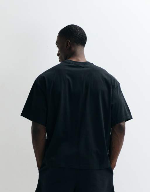 Nike - Oversized T-shirt met retro logo in zwart, 5 van 5