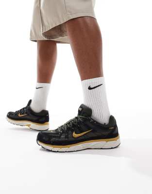 Nike - P-6000 - Baskets unisexes - Noir et doré | ASOS