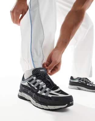 Кроссовки Nike P-6000 черного и темно-серого цветов 23890₽