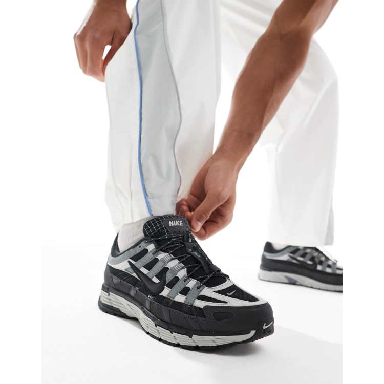 Nike P 6000 sneakers in black and dark gray ASOS