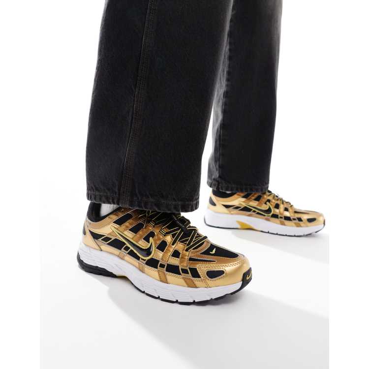 Nike P-6000 sneakers in black and gold | ASOS