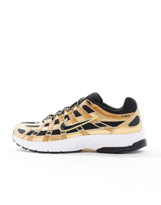Nike P-6000 sneakers in black and gold