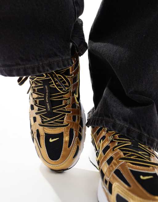 Nike P-6000 sneakers in black and gold