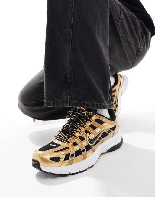 Nike P-6000 sneakers in black and gold