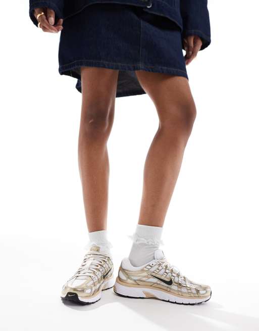Nike P-6000 sneakers in white and gold