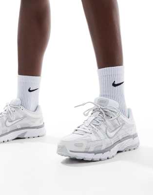 Shop Nike P-6000 Sneakers In White And Silver