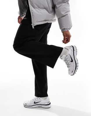 Size 13.0 Nike Nike P-6000 trainers in white and metallic silver trainers