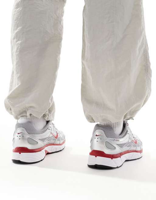 Nike P-6000 trainers in metallic silver and red 