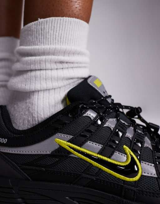 Nike P-6000 utility unisex trainers in black and yellow ASOS