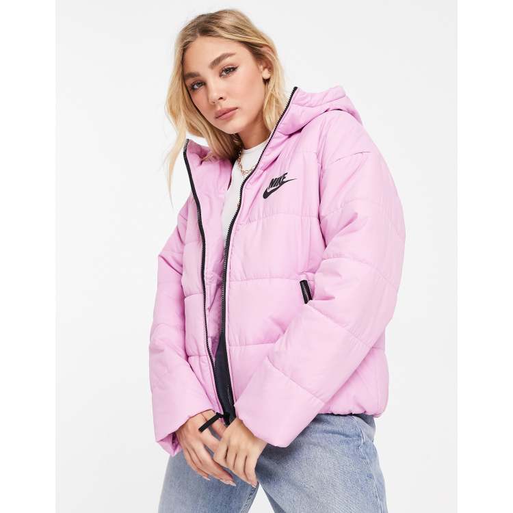 Nike padded jacket with back swoosh in soft pink ASOS