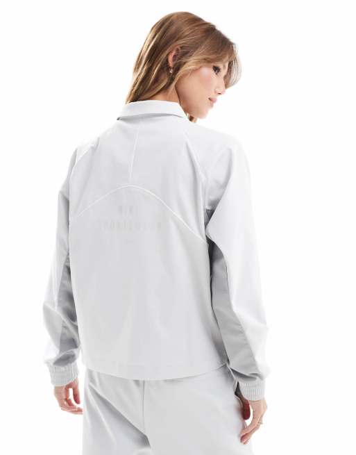 Nike panelled woven jacket in gray | ASOS