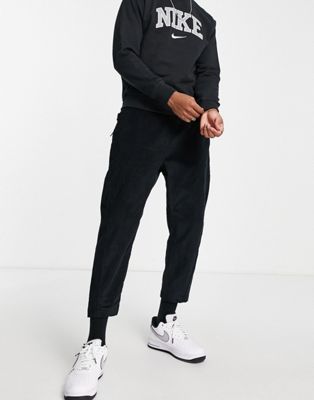 Pantalons et chinos Nike - Pantalon court fuselé en velours côtelé - Noir