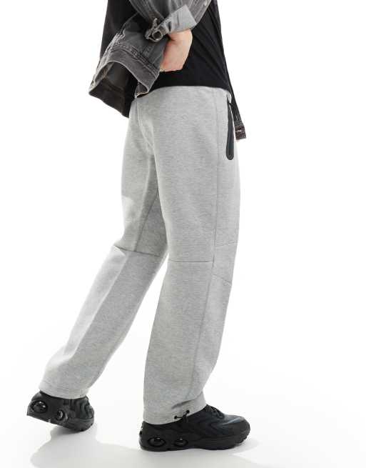 Nike Pantalon de jogging ample en polaire technique avec cordon de serrage Gris