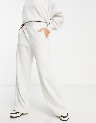 Nike plush joggers in light bone - ASOS Price Checker