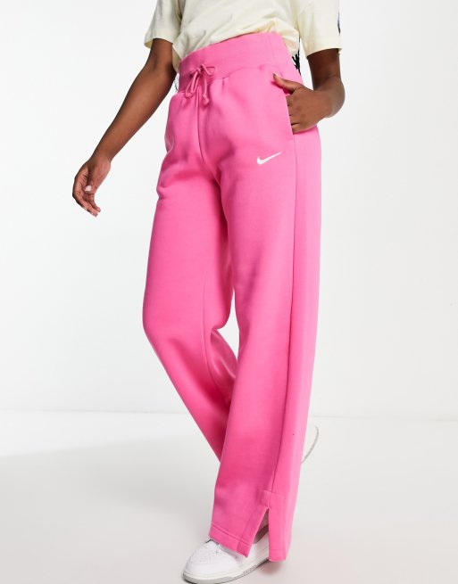 Nike Pantalon de jogging large taille haute avec petit logo virgule Rose