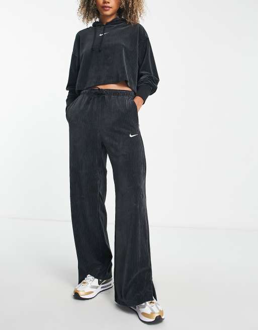 Nike Pantalon de jogging large en velours cotele Noir