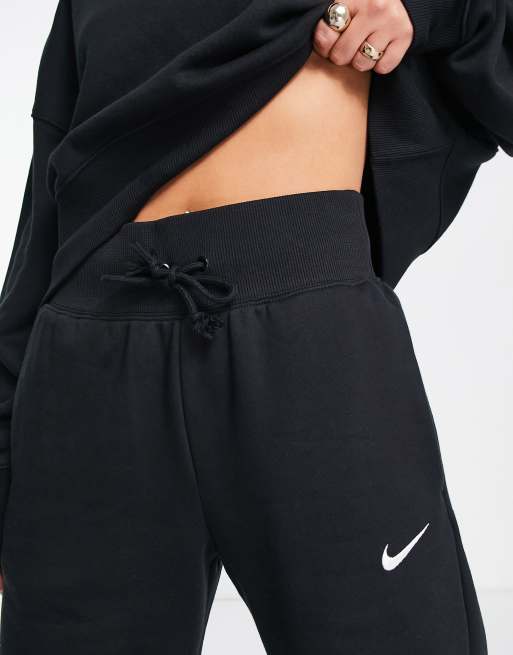 Nike - Pantalon de jogging large taille haute avec petit logo virgule - Noir  et voile