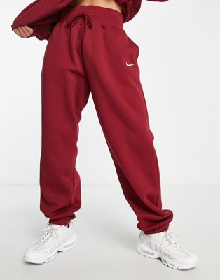 Nike - Pantalon de jogging oversize à petit logo virgule - Rouge campus