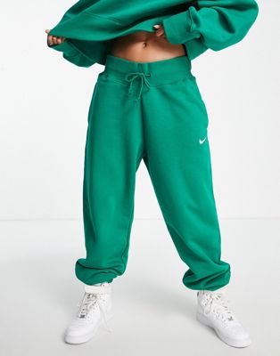 Nike - Pantalon de jogging oversize à taille haute et petit logo virgule - Vert malachite | ASOS