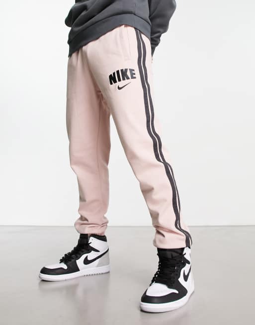 Jogging nike gris store et rose