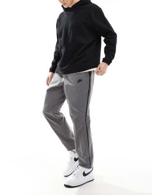 Nike - Pantalon technique tissé - Argenté réfléchissant