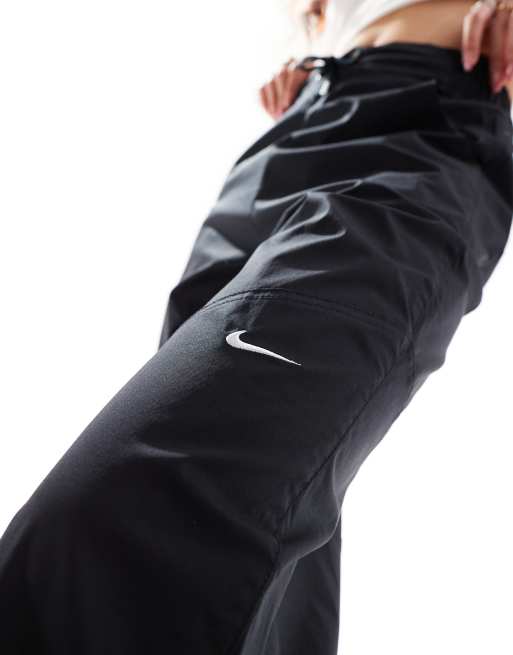 Nike Pantalon tiss taille haute et petit logo virgule Noir