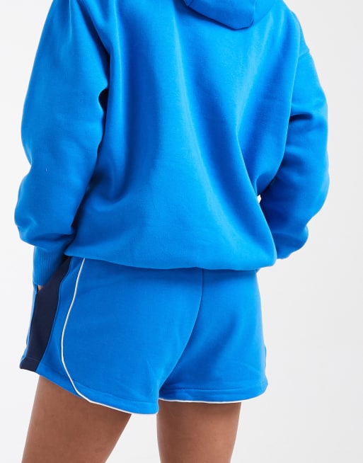 Nike - Pantaloncini in felpa a vita medio alta da 8 cm blu, 5 di 5