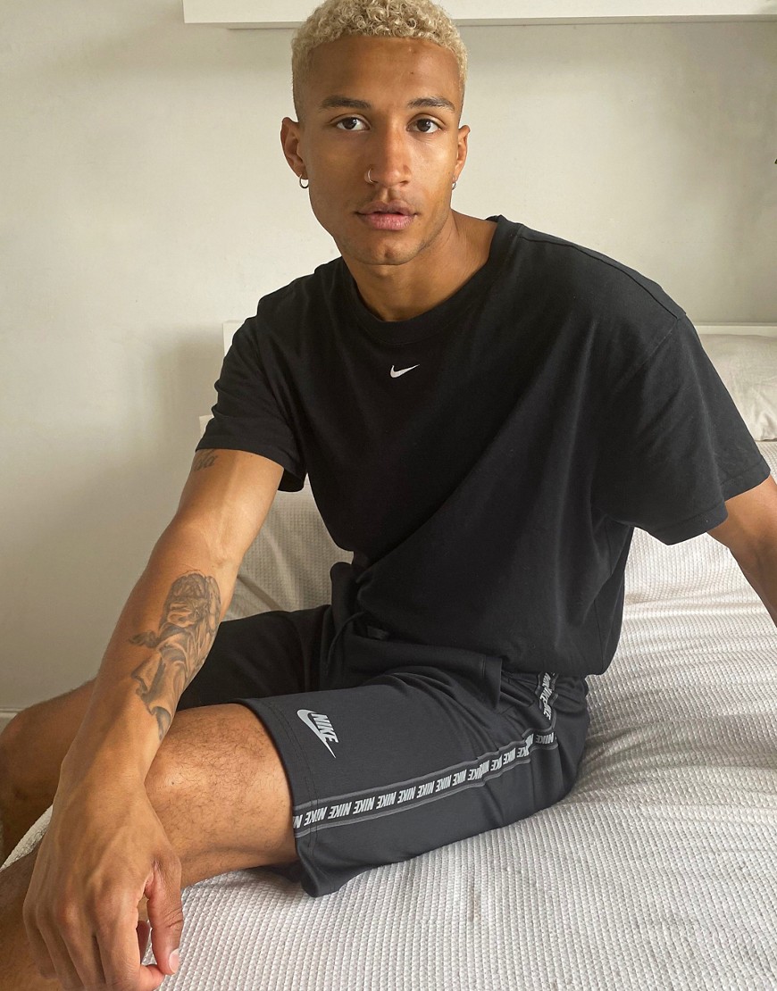 Nike - Pantaloncini in maglia di poliestere neri con fettucce con logo-Nero