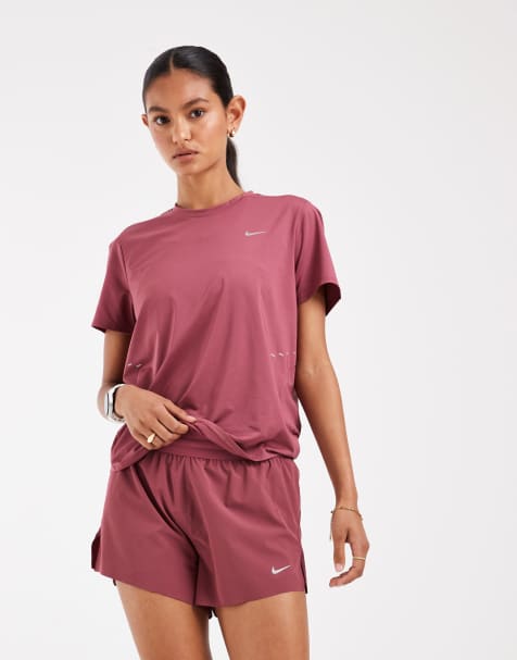 Nike - pantalones cortos Swift Dri-FIT de talle medio 2 en 1 en rosa - view 1