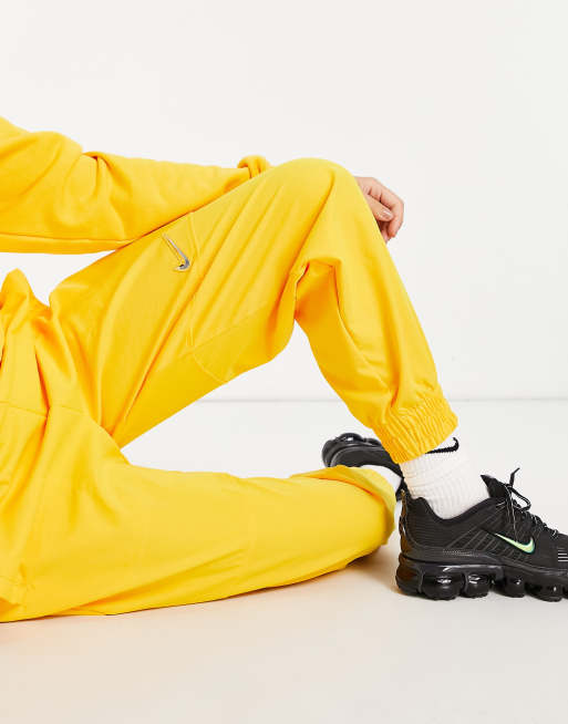 Pantaloni nike giallo deals