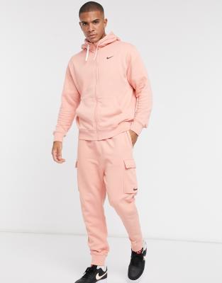 Nike - Pastel Pack - Carg joggingbroek met boorden in vaaloranje | ASOS