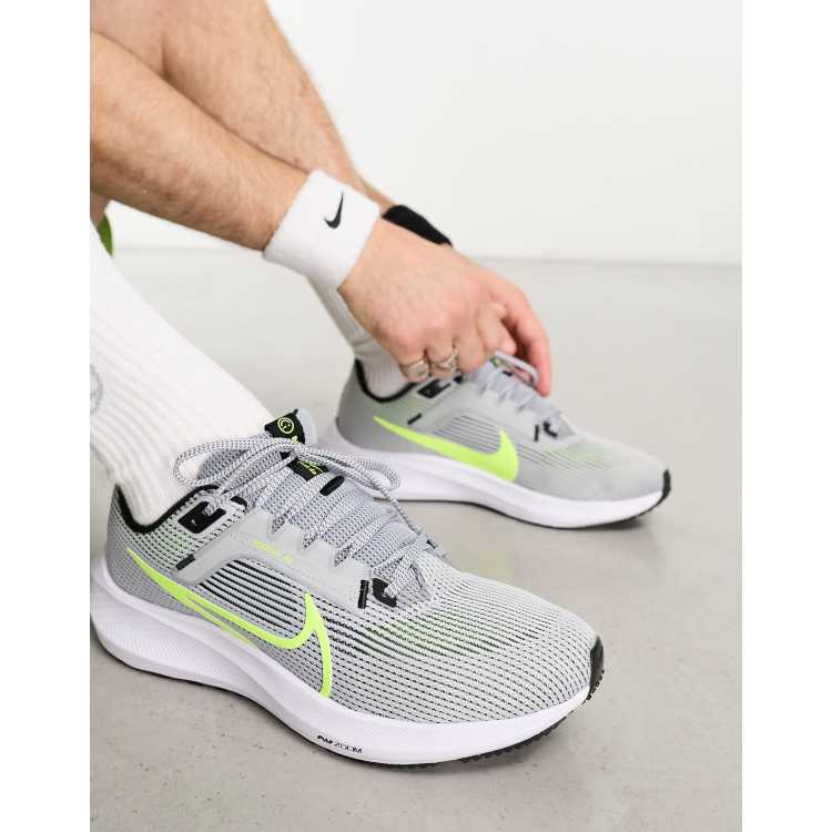 Nike gray best sale and green shoes