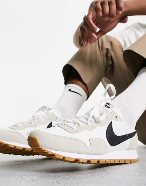 Nike pegasus 83 sneakers in white and black |