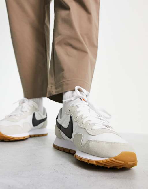 Nike pegasus 83 sneakers in white and black ASOS