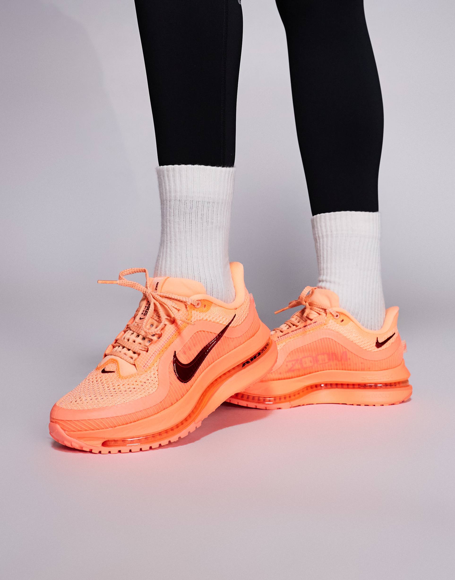 nike pegasus premium sneakers in orange and pink