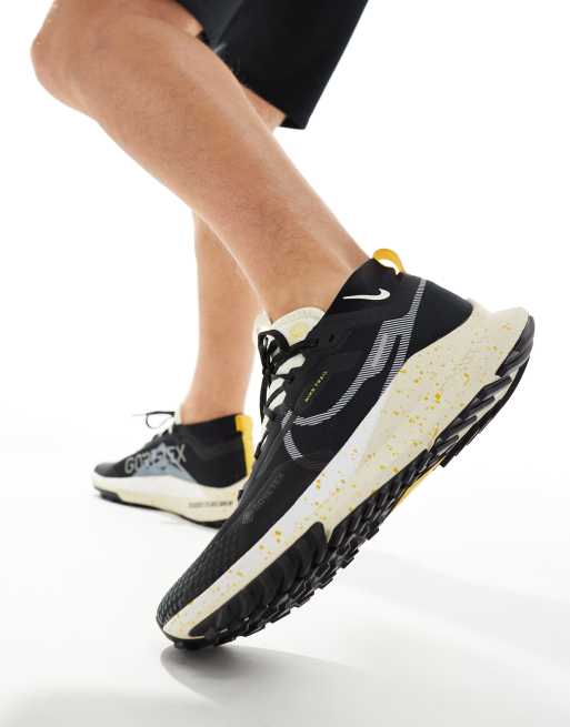 Nike Pegasus Trail 4 sneakers in black and coconut milk